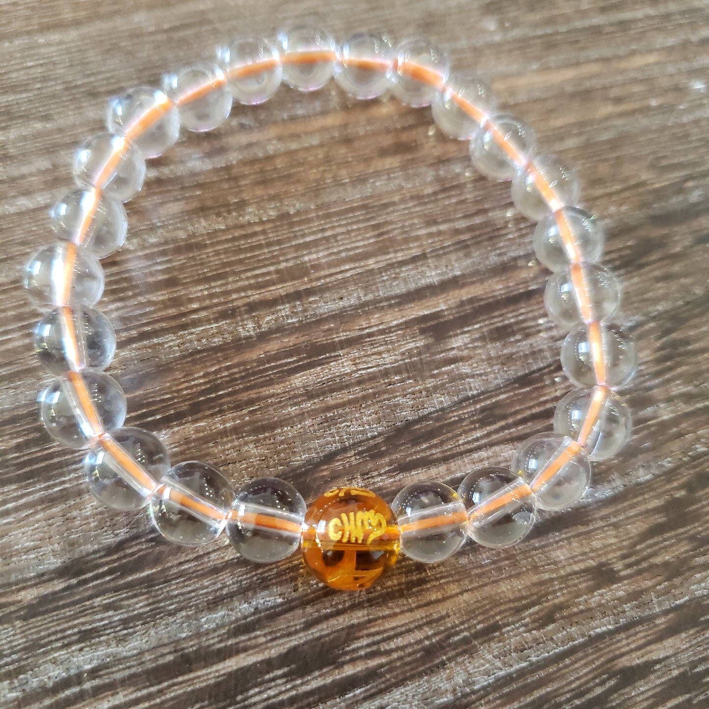 Clear beads with colored mantra & colored string