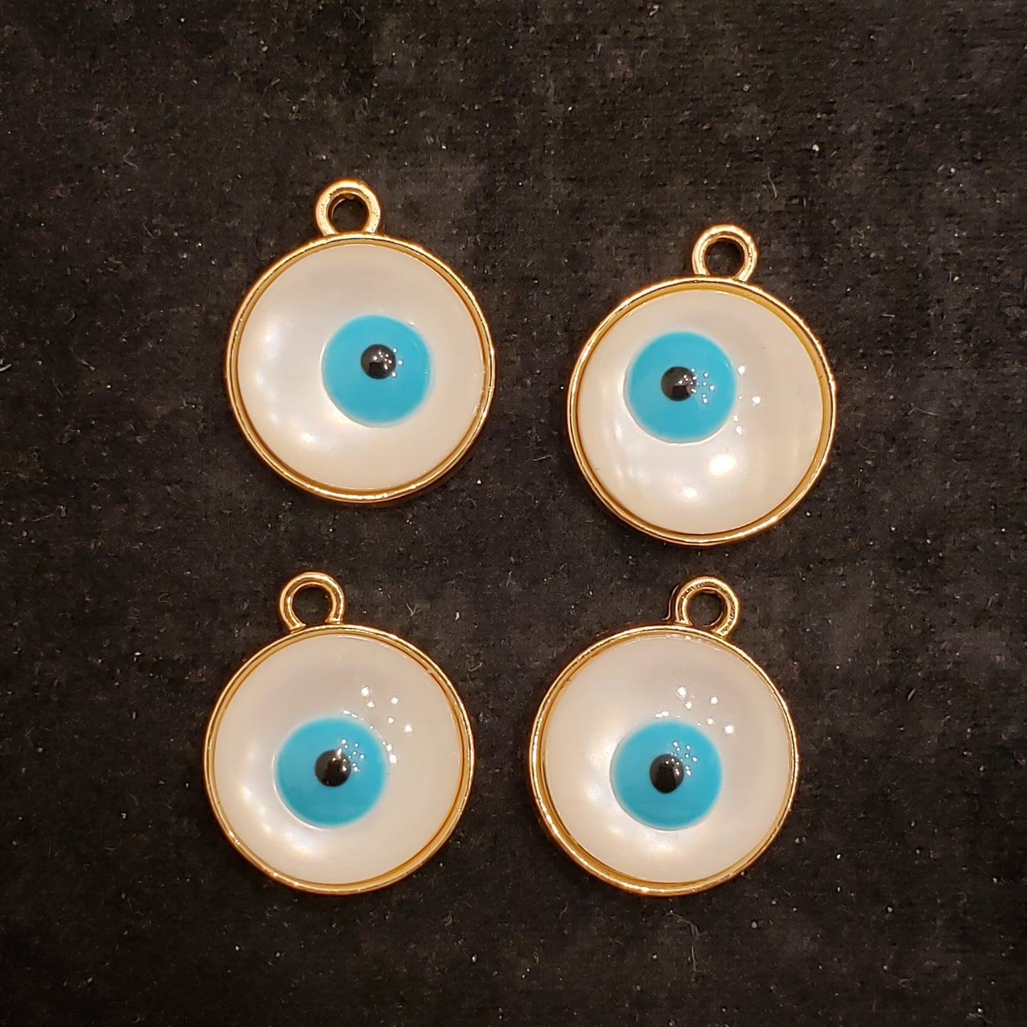 Evil eye charms